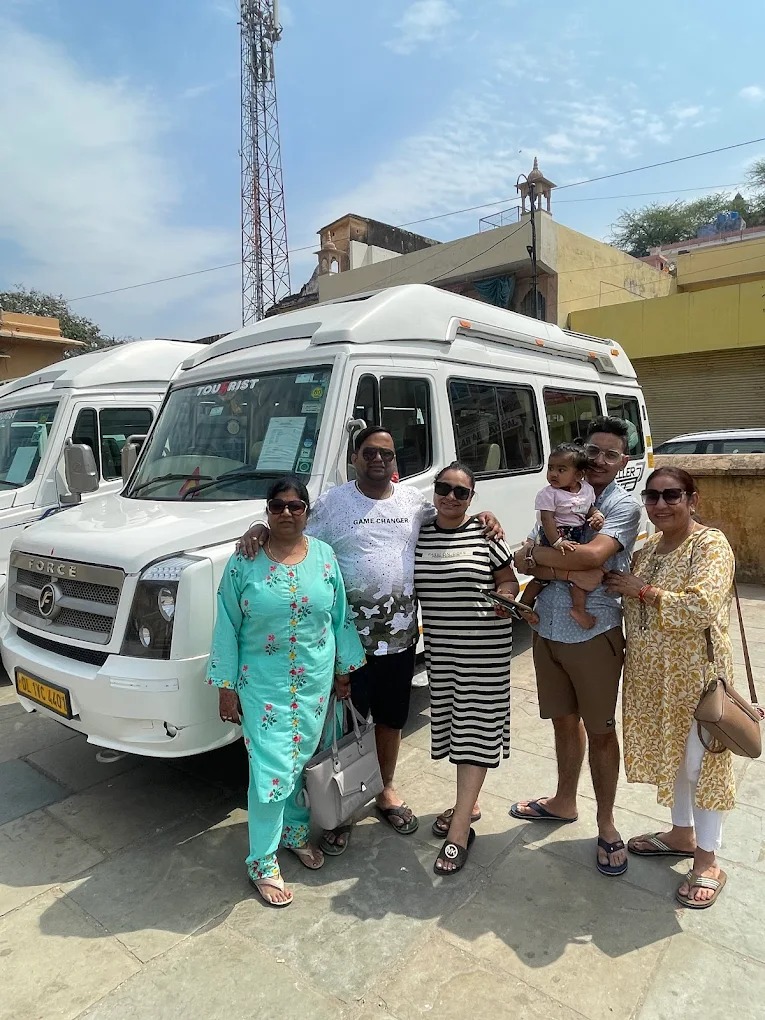 Family enjoying a luxury tempo traveller tour