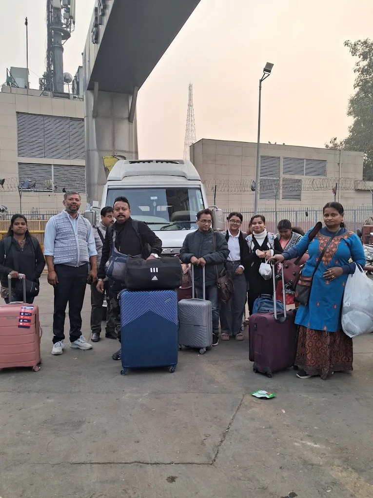 Satisfied group of friends on a road trip adventure across Uttarakhand valleys